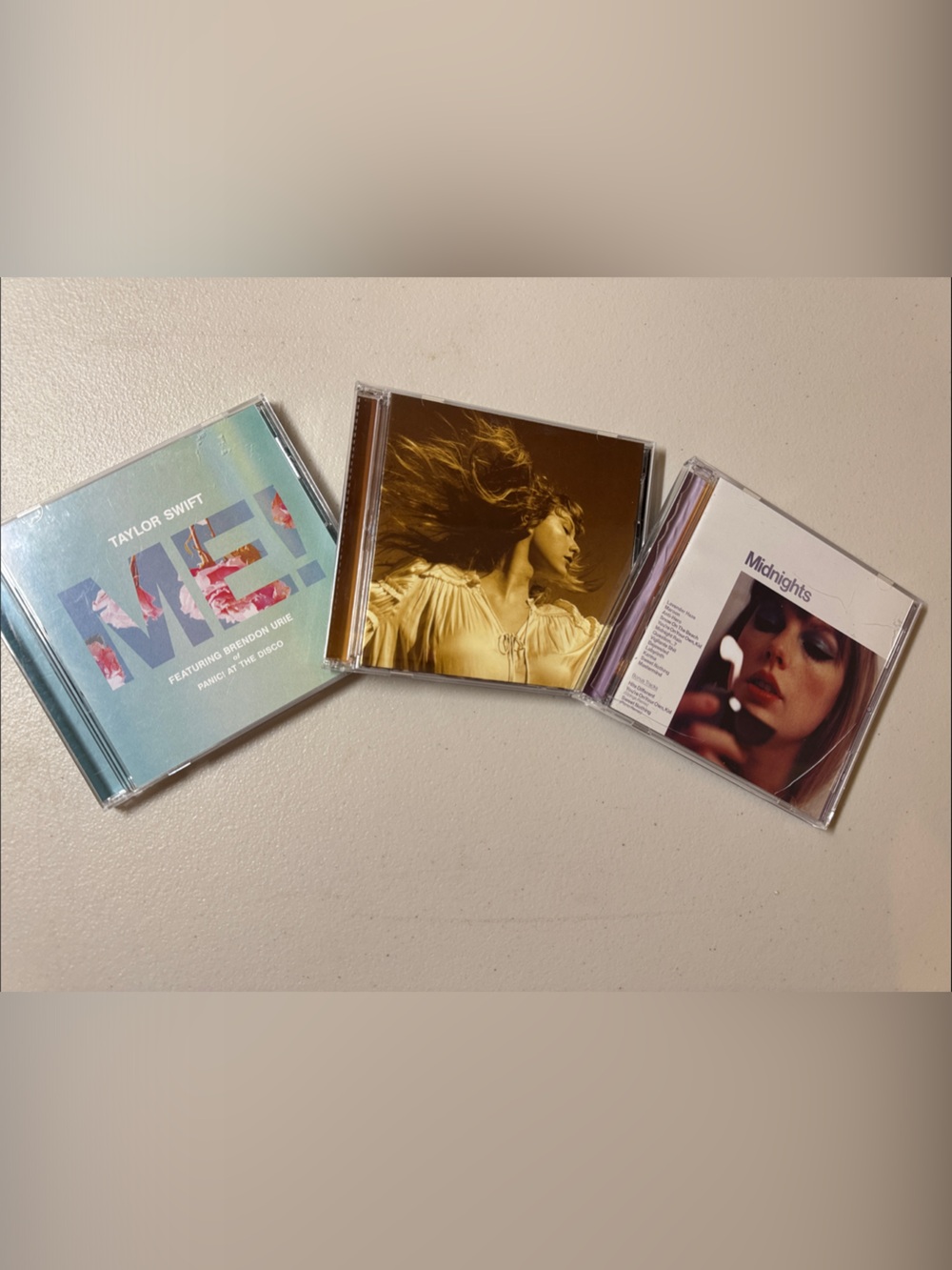 3 Taylor swift CDs